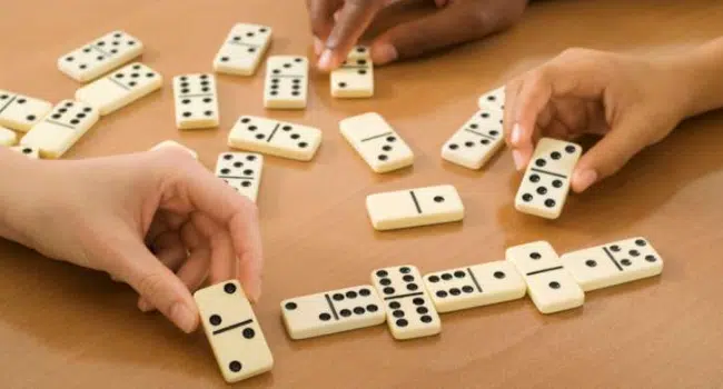 Winning Strategies for Success in Dominoes